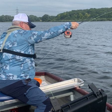 jim crawford playing a fish